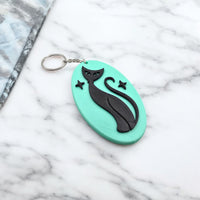 Retro Atomic Cat Oblong Keychain